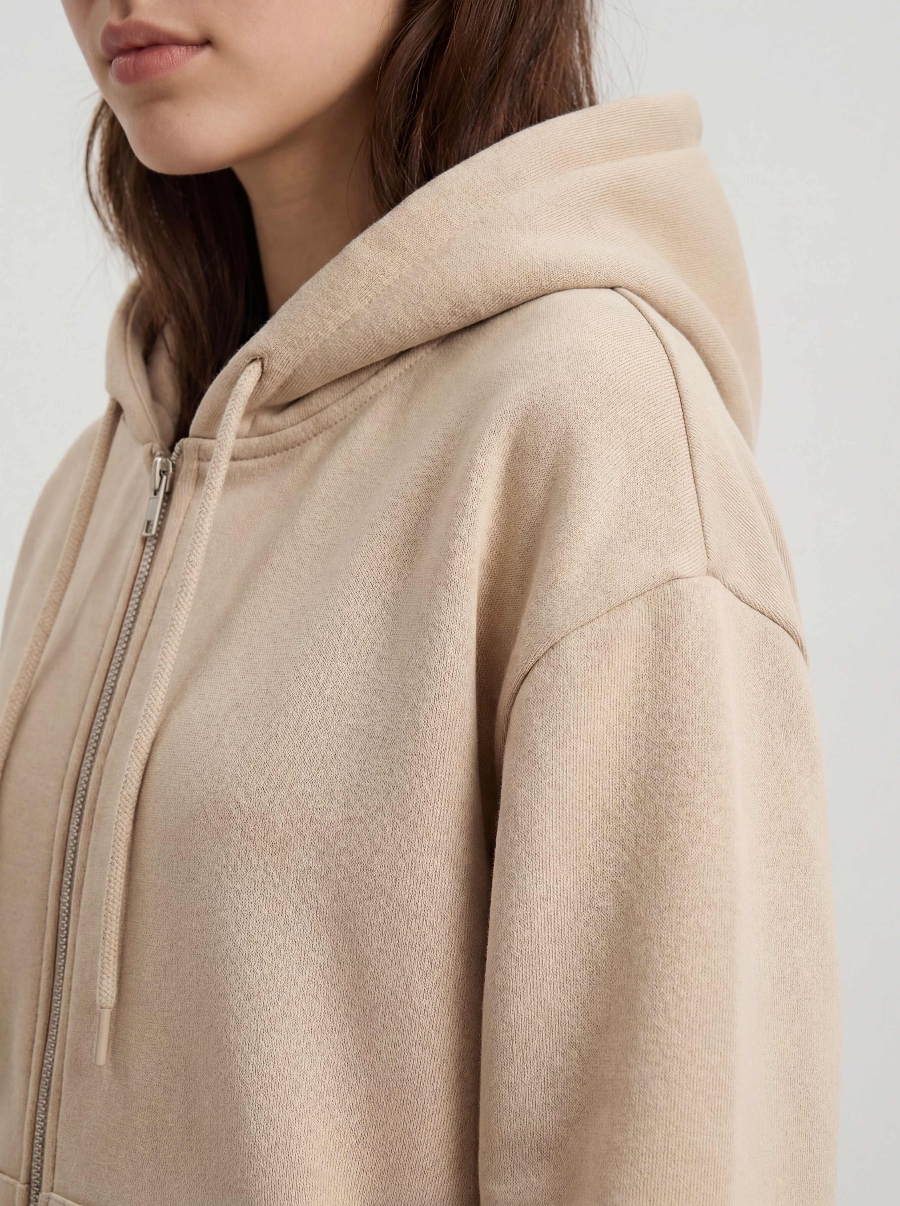 Sand hoodie shoulder and hood detail close-up